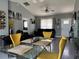 Stylish living space showcasing a dining area, comfortable seating, and modern accents at 1100 Nw 126Th Ln, Citra, FL 32113