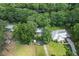 Expansive aerial view showcases the property, complete with well-maintained lawn and driveway at 11170 Sw 190Th Ave, Dunnellon, FL 34432