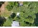 Aerial view of a home surrounded by lush greenery near a tranquil river at 11170 Sw 190Th Ave, Dunnellon, FL 34432