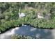 Aerial view of a beautiful waterfront home with stunning river access at 11170 Sw 190Th Ave, Dunnellon, FL 34432