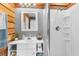 Cozy bathroom featuring a walk-in shower, bright lighting, and modern fixtures at 11170 Sw 190Th Ave, Dunnellon, FL 34432
