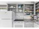 Bright kitchen featuring white appliances, shaker cabinets, and stylish countertops at 11170 Sw 190Th Ave, Dunnellon, FL 34432
