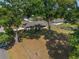 Aerial view of the home's screened in porch and large backyard at 1601 Ne 47Th Ct, Ocala, FL 34470