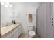 Well-lit bathroom with a shower/tub combo, vanity, and neutral color scheme at 1601 Ne 47Th Ct, Ocala, FL 34470
