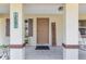 Welcoming front door with decorative accents, adding a touch of charm to the exterior of this inviting home at 1601 Ne 47Th Ct, Ocala, FL 34470