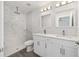 Modern bathroom with double sink vanity, quartz countertop, and a beautiful tile shower at 16697 Sw 30 Avenue Rd, Ocala, FL 34473