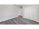This bedroom boasts a spacious closet, light gray floors, and neutral paint at 16697 Sw 30 Avenue Rd, Ocala, FL 34473
