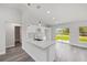 Bright kitchen with modern white cabinets and quartz countertops at 16697 Sw 30 Avenue Rd, Ocala, FL 34473