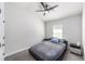 Cozy bedroom with a comfortable bed, window, and neutral color scheme at 181 Nw 45Th Loop, Ocala, FL 34475