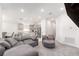 Spacious open-concept living area with modern finishes, seamlessly connecting the kitchen and dining spaces at 181 Nw 45Th Loop, Ocala, FL 34475