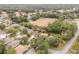 Scenic aerial view showcases neighborhood homes amidst lush greenery, offering a serene, secluded living environment at 19586 Sw 84Th Pl, Dunnellon, FL 34432