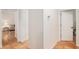 Hallway displaying tile floors, neutral paint and white molding at 19586 Sw 84Th Pl, Dunnellon, FL 34432