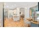 Open concept kitchen with breakfast nook, stainless steel appliances, and seamless flow to living spaces at 19586 Sw 84Th Pl, Dunnellon, FL 34432