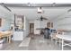 Spacious garage featuring the water heater, utilities, washer/dryer, and room for storage at 2608 Botello Ave, The Villages, FL 32162