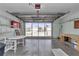 View of the interior of the garage showcasing the garage door and exterior view at 2608 Botello Ave, The Villages, FL 32162