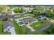 Aerial view of property with a pool, fenced-in yard, and well-kept landscaping at 2671 Sw 158Th Lane Rd, Ocala, FL 34473