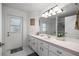 Bathroom featuring a vanity with drawers and a large mirror at 2671 Sw 158Th Lane Rd, Ocala, FL 34473