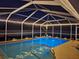 Indoor pool area with ambient lighting, perfect for evening swims and relaxation at 2671 Sw 158Th Lane Rd, Ocala, FL 34473