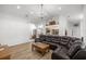 Open-concept living room featuring a spacious layout, modern finishes, and seamless flow to the kitchen at 2671 Sw 158Th Lane Rd, Ocala, FL 34473