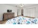 Bright bedroom with ceiling fan, closet and spacious layout at 30 Bahia Trace Loop, Ocala, FL 34472