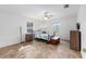 Spacious bedroom features neutral walls, ceiling fan, and dual windows at 30 Bahia Trace Loop, Ocala, FL 34472