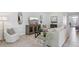 Stylish living room with modern furniture, neutral tones, and decorative accents at 3066 Canopy Oak Blvd, Wildwood, FL 34785