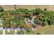 Aerial view of the property highlighting the mature trees surrounding the home at 4701 Nw 60Th Terrace, Ocala, FL 34482