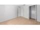 Bedroom features wood-look flooring and access to a closet at 4701 Nw 60Th Terrace, Ocala, FL 34482