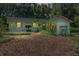 Charming single-story home with a well-manicured lawn and lush landscaping at 4701 Nw 60Th Terrace, Ocala, FL 34482
