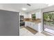 Beautiful kitchen with white cabinetry, stainless steel appliances, and granite countertops at 4701 Nw 60Th Terrace, Ocala, FL 34482
