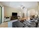 Comfortable living room with hardwood floors, modern furniture, and a cozy ambiance at 6235 Sw 95Th Pl, Ocala, FL 34476