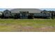 Charming single-story home with well-manicured lawn, mature trees, and inviting curb appeal in a serene neighborhood at 6925 Nw Highway 225A, Ocala, FL 34482