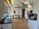 Spacious kitchen featuring modern appliances, white cabinets, eat-in nook, and bright, open layout perfect for gathering at 6925 Nw Highway 225A, Ocala, FL 34482