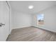 Inviting bedroom with ample natural light, modern flooring, and closet, perfect for rest and relaxation at 7 Walnut Pl, Ocala, FL 34480
