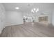Bright open-concept layout with views of the kitchen and outdoor space at 7 Walnut Pl, Ocala, FL 34480