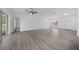 Spacious living room featuring a sliding glass door and contemporary finishes at 7 Walnut Pl, Ocala, FL 34480