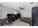 Comfortable bedroom with a ceiling fan, neutral paint, and plush carpeting at 7442 Sw 129Th Ln, Ocala, FL 34473