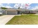 Attractive home with a manicured lawn and RV parking at 7442 Sw 129Th Ln, Ocala, FL 34473
