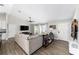 Bright living room with vaulted ceilings, tile floors and modern furnishings at 7442 Sw 129Th Ln, Ocala, FL 34473