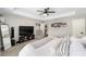 Inviting main bedroom features neutral walls, plush carpeting, and a comfortable seating area at 7442 Sw 129Th Ln, Ocala, FL 34473