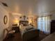 Comfortable main bedroom with neutral decor, bedside lamps, and a cozy ambiance at 7800 Sw 127Th Loop, Ocala, FL 34473