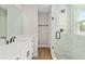 Modern bathroom featuring glass shower and vanity at 8293 Se 158Th St, Summerfield, FL 34491