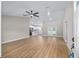 Open concept living space features hardwood floors and abundant natural light at 8293 Se 158Th St, Summerfield, FL 34491