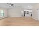 Living room showcasing wood floors, recessed lighting, and open floor plan at 8293 Se 158Th St, Summerfield, FL 34491