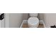 Clean bathroom with a standard toilet and neutral color scheme at 8293 Se 158Th St, Summerfield, FL 34491