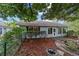 Scenic backyard with mature trees and an ornamental fountain feature at 9001 Sw 91St Cir, Ocala, FL 34481