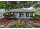 Charming backyard with lush greenery and artistic water feature at 9001 Sw 91St Cir, Ocala, FL 34481