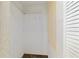 Walk-in closet features built-in shelving and ample storage space at 9001 Sw 91St Cir, Ocala, FL 34481