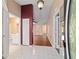 Welcoming foyer with tile flooring and views into the living area at 9001 Sw 91St Cir, Ocala, FL 34481