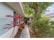 Landscaped front yard with decorative plants leading to the front door at 9001 Sw 91St Cir, Ocala, FL 34481